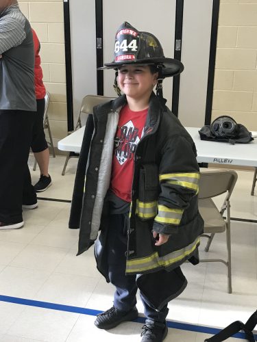 Students were able to try on fire gear and talk with an Aurora Firefighter.