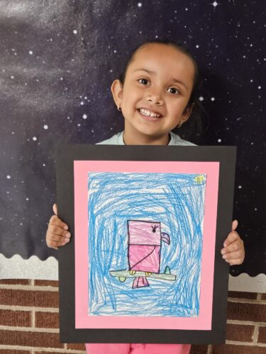 Jacqueline Agramon Santana shows off her art work.